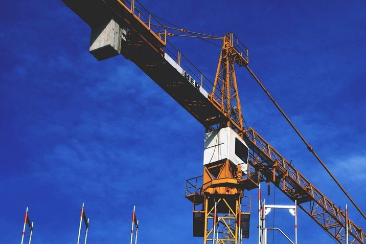 Construction crane over a building site